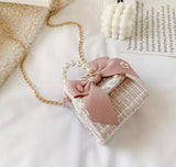 The “C” Inspired Bow Purse